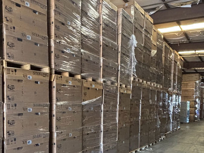 Stocked plumbing supply shelves in the warehouse at Hughes Supply Hudson Florida